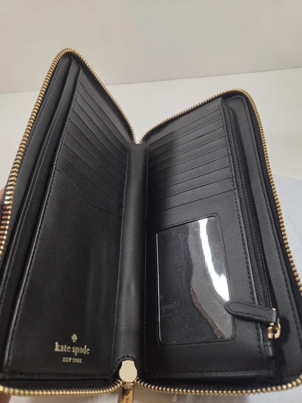 kate spade New York Black Saffiano Wristlet with Gold Logo